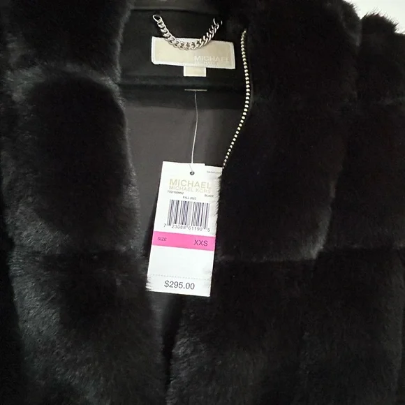 Beautiful NEW black faux fur Michael Kors Vest.Sized XXS, fits like a small.